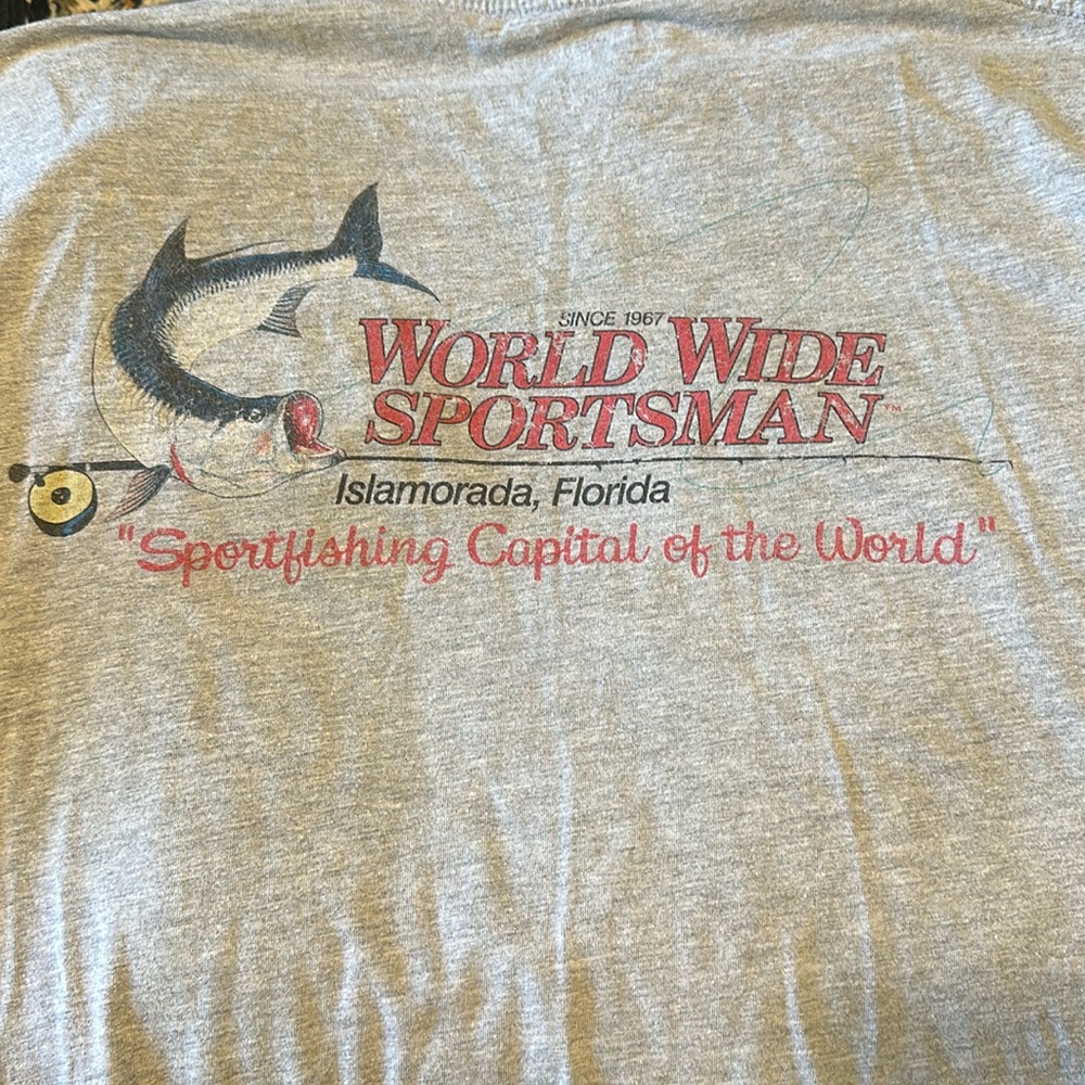 Bass Pro, Worldwide Sportsman long sleeved grey shirt with left front pocket